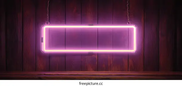 Pink Neon Sign on Wooden Background