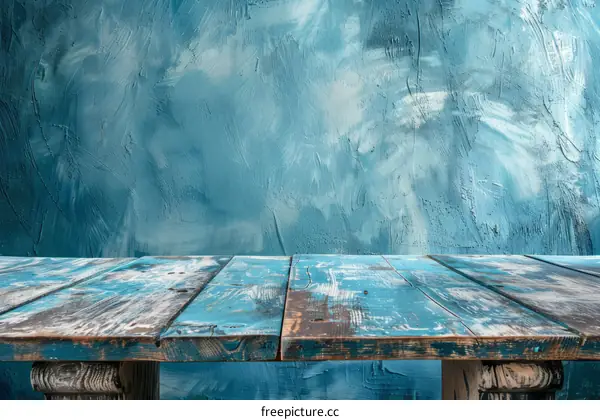 Wooden table with a blue background