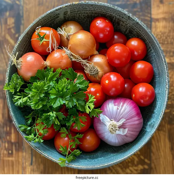 A bowl of tomatoes, onions, and parsley