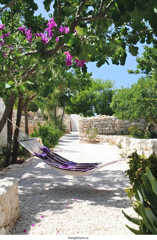Relaxing Hammock in a Lush Garden with Stone Walls