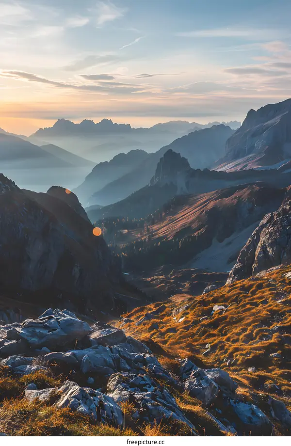 Mountain Range With Sunset And Fog