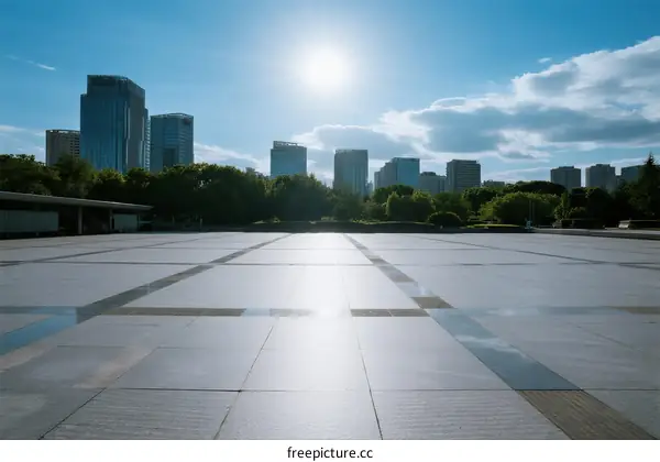 Sunlit Urban Plaza with Modern Skyscrapers in the Background