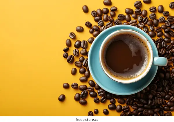 Coffee Cup With Coffee Beans On Yellow Background