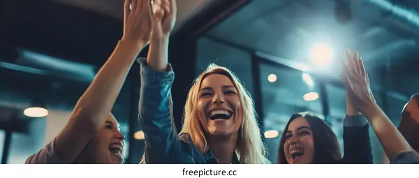 Cheerful  Group of  Friends Giving  High Five  Indoor