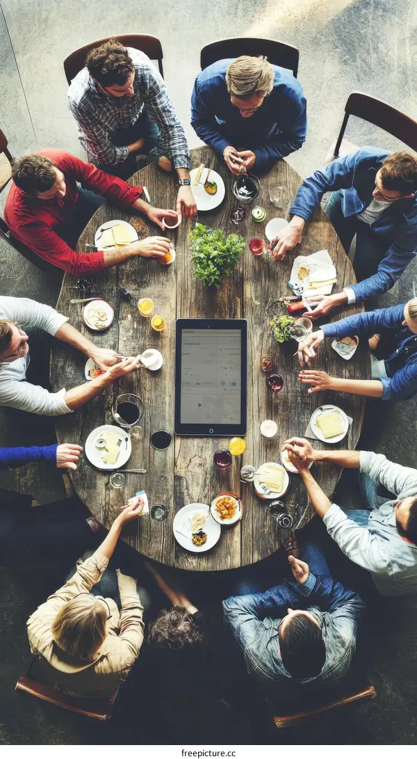 Group of Diverse People Having a Meal Together