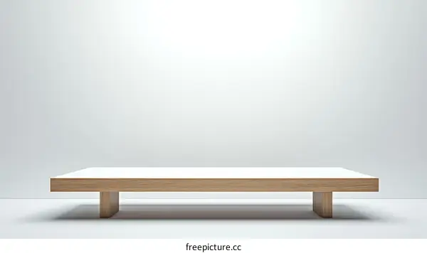Modern Wooden Display Table Against White Wall