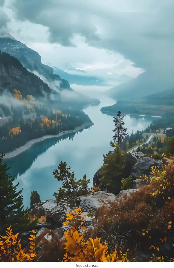Aerial View of a Winding River in a Mountain Valley