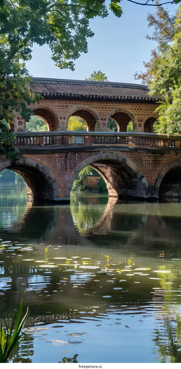 a bridge with reflection in the water