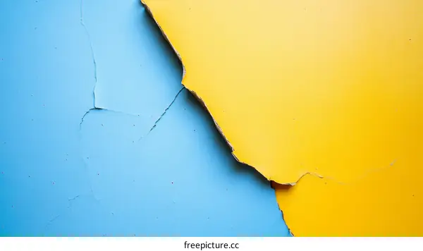 Cracked Painted Surface with Blue and Yellow Colors