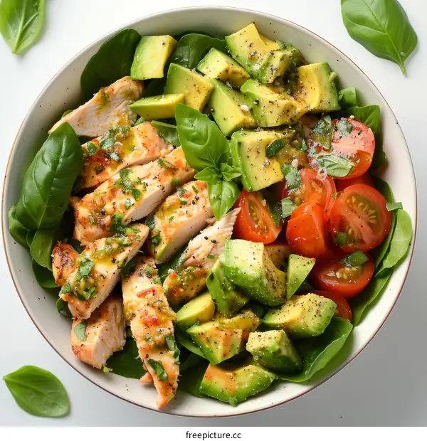 Grilled Chicken Breast Salad with Avocado, Tomato, and Spinach