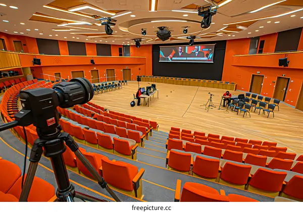 Empty Auditorium Stage with Camera Equipment