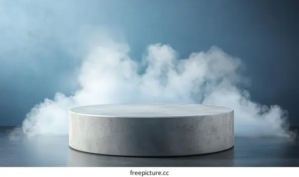 Gray Concrete Cylinder Display Stand in Foggy Studio