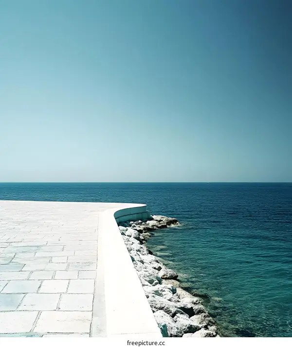 Sea and Coastal Walkway with a Curve