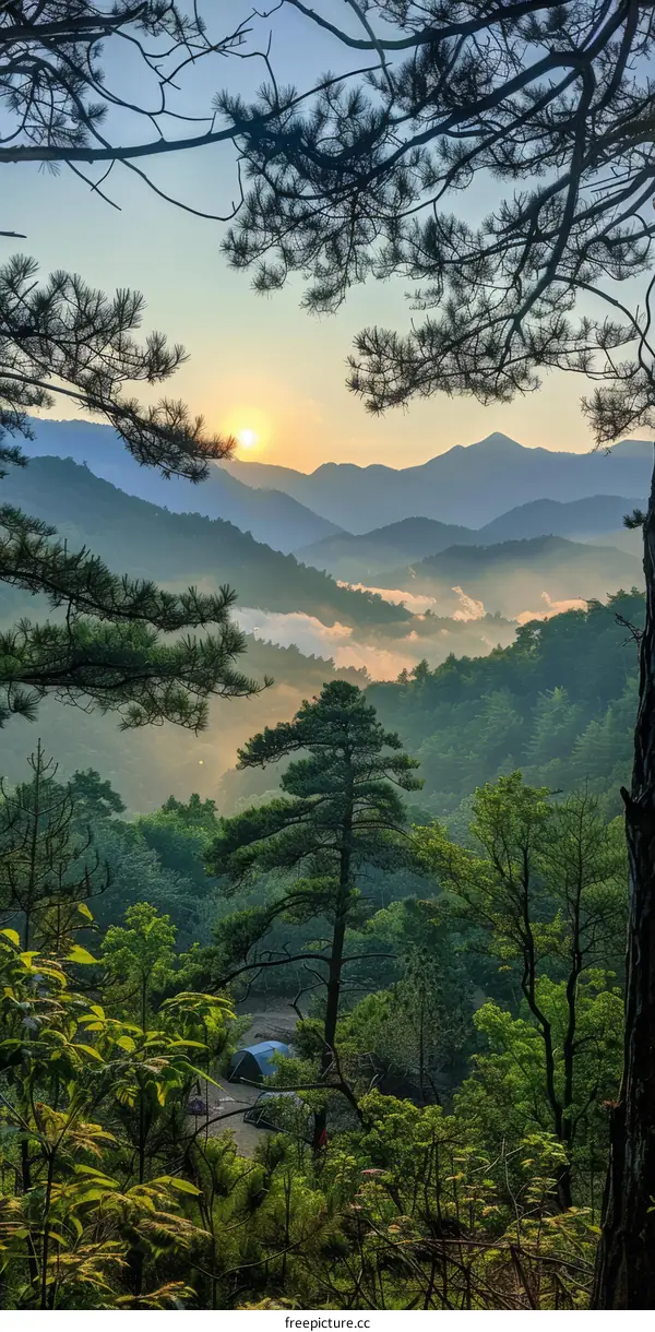 The sun rises over a beautiful mountain landscape