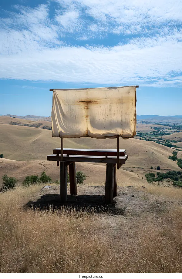 Wooden Bench with Fabric Canopy on Hilltop