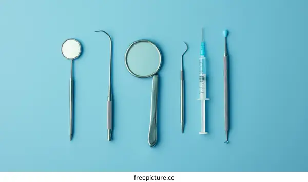 Dental instruments on a blue background