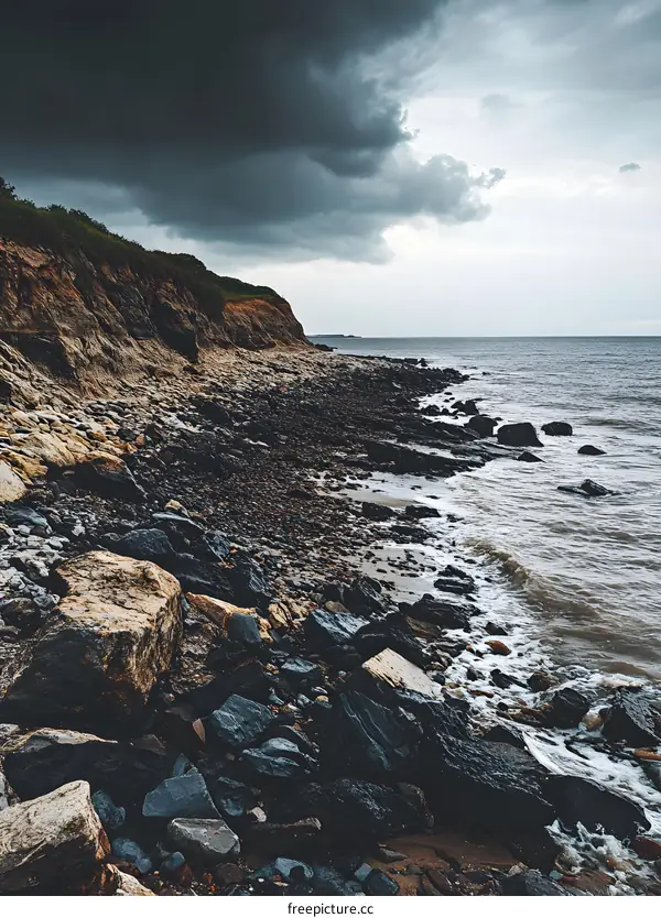 Dark Clouds Over Rocky Beach
