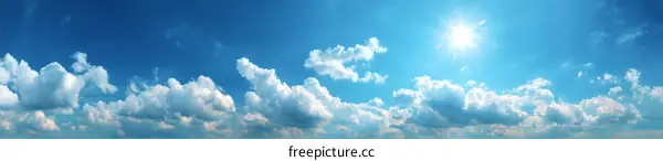 Beautiful Sunny Blue Sky with Fluffy Clouds