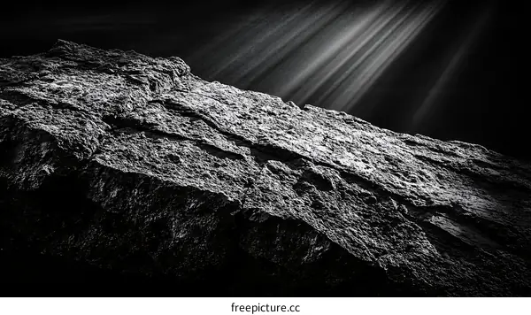 Black and White Rock Formation with Light Rays