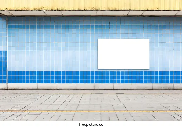Blank Billboard on Blue Tile Wall