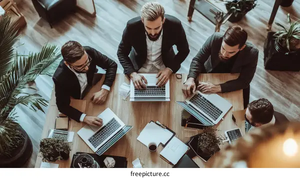 Business Meeting Top View Four Caucasian Men