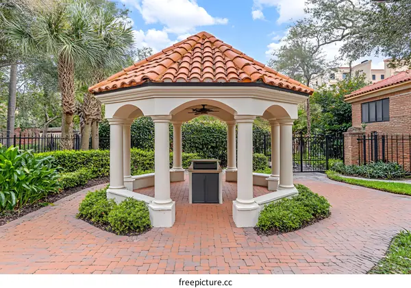 Outdoor Gazebo with Red Tile Roof and Brick Patio