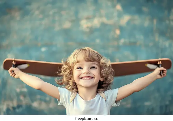 A Child Playing with a Wooden Airplane Wing