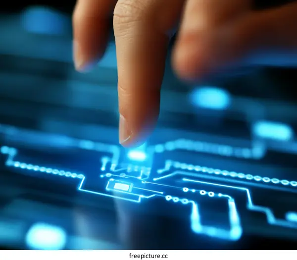Finger Touching Futuristic Circuit Board