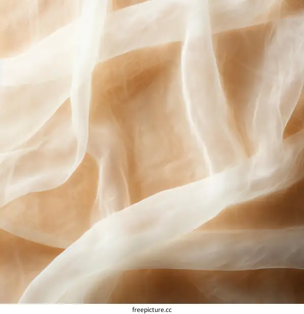 Close-up of Wrinkled Beige Fabric Texture