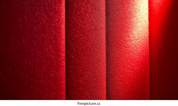 Close Up View of Vibrant Red Fabric Texture