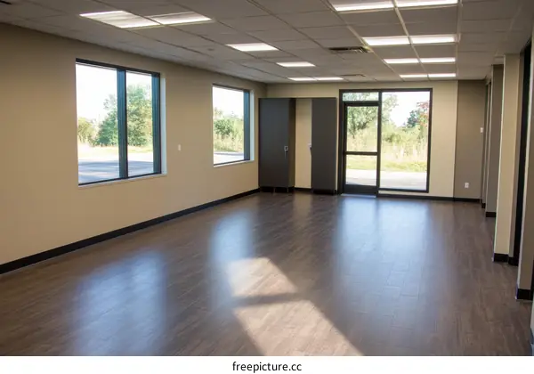 Empty Modern Office Space with Large Windows