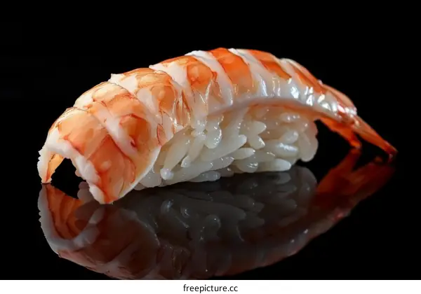 A delicious sushi with fresh shrimp on top
