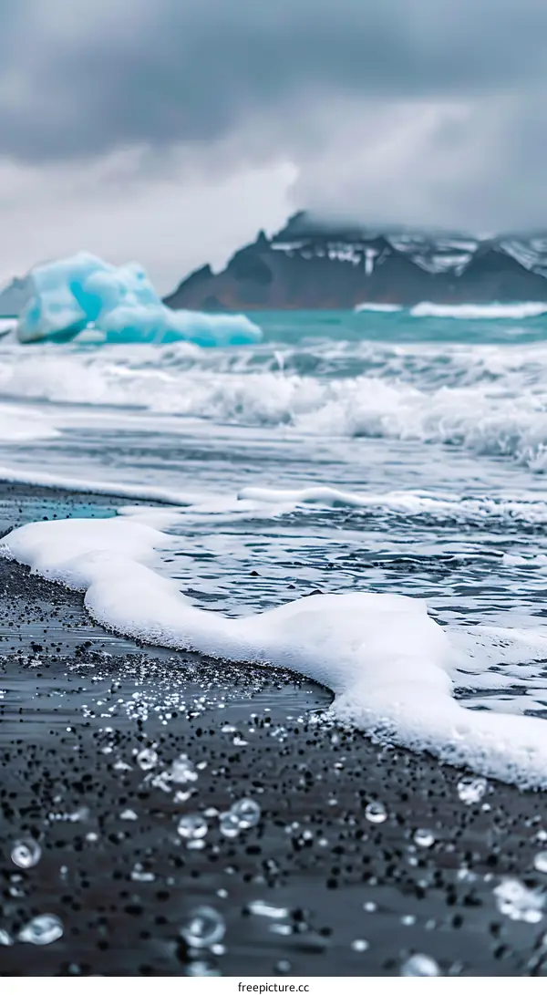 Black Sand Beach Waves and Icebergs