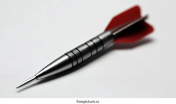 Close-up of a Dart on a White Surface