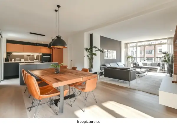 Modern Open-Plan Apartment with Stylish Kitchen and Dining Area