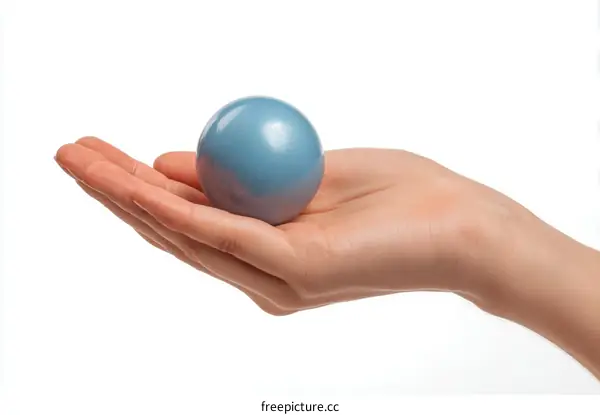 Hand Holding a Light Blue Sphere