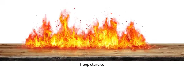 Burning Flames on Wooden Surface Image