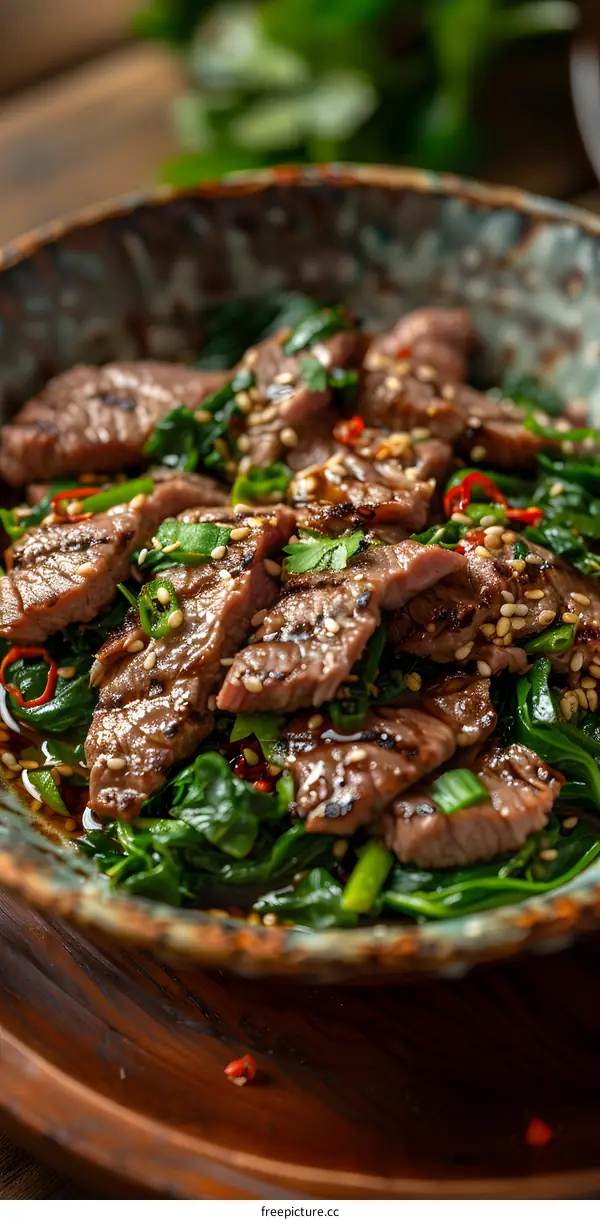 Beef with spinach in bowl