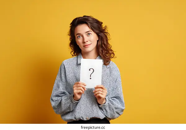 Woman Holding Question Mark Sign Studio Portrait