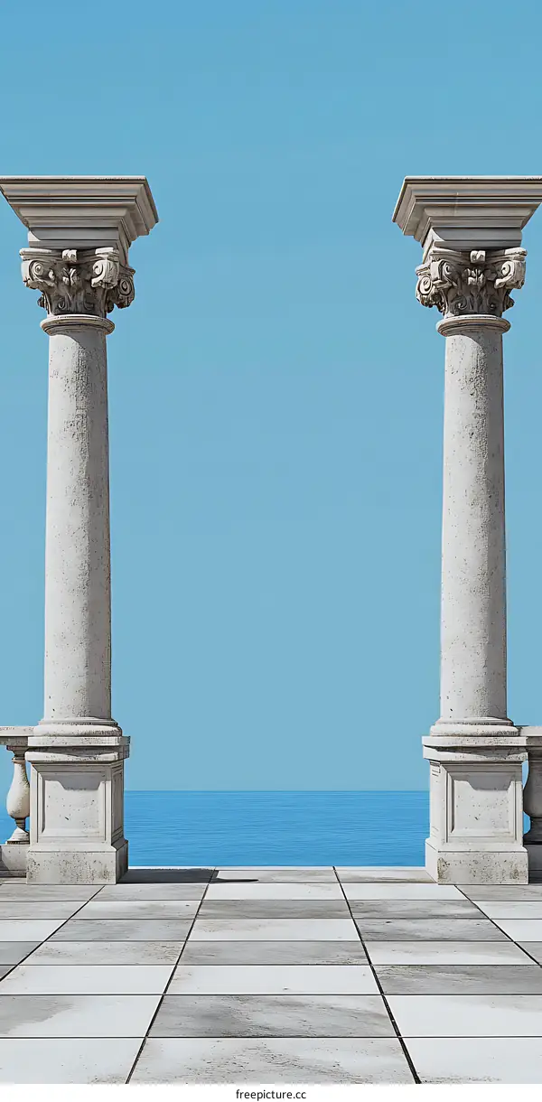 Two White Pillars on a Stone Floor with Ocean View