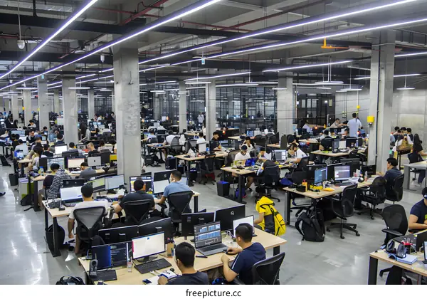 Modern Open Plan Office Space with Many Workers