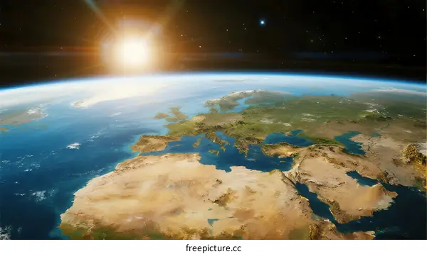 Earth from space showing bright sun and blue oceans