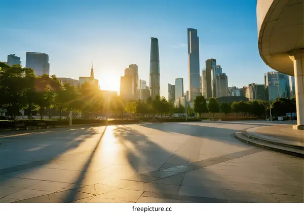Sunset view of modern city skyline with tall buildings