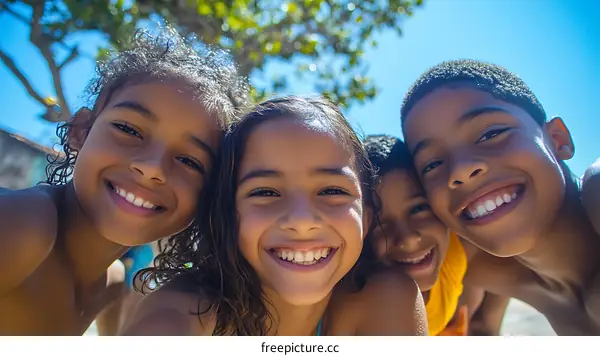 Four Children Smiling Close Together