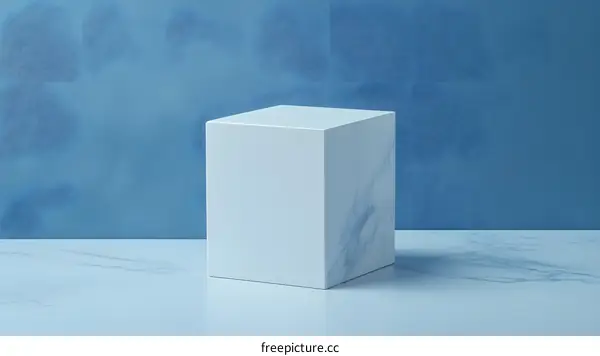 Minimalist Marble Cube on Blue Background