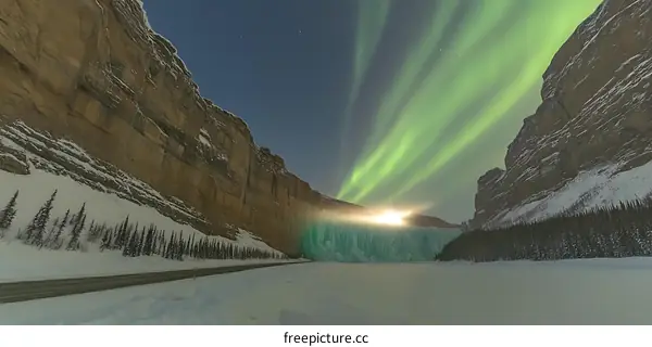 Frozen Waterfall With Northern Lights