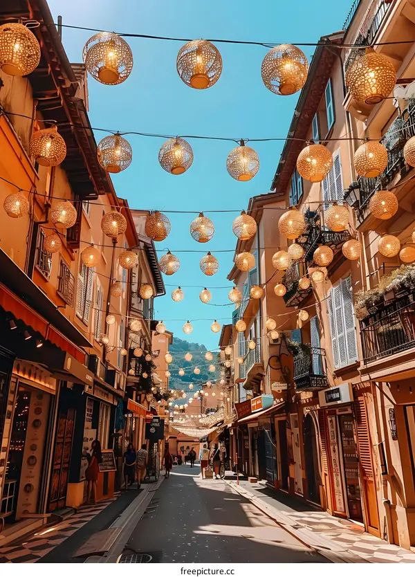 Cobblestone Street Decorated with String Lights in European City