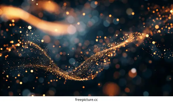 Golden particles flowing in a dark blue background