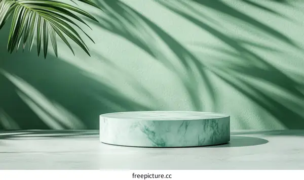 Green Marble Podium Display with Tropical Leaf Shadows