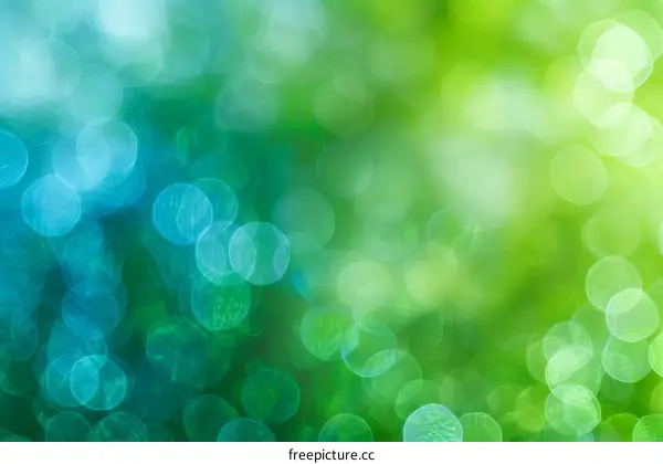 Green and blue blurred background with circles of light
